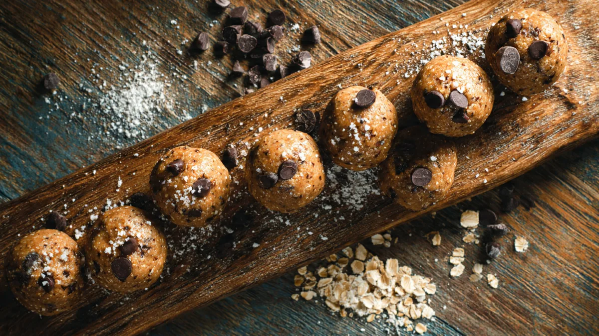 Cookie Dough Protein Balls: Your Guilt-Free Fix for Cravings! Cookie Dough Protein Balls Delicious homemade cookie dough protein balls with chocolate chips and oats.