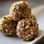 High-Protein Peanut Butter Energy Balls on a wooden board ready for a healthy snack