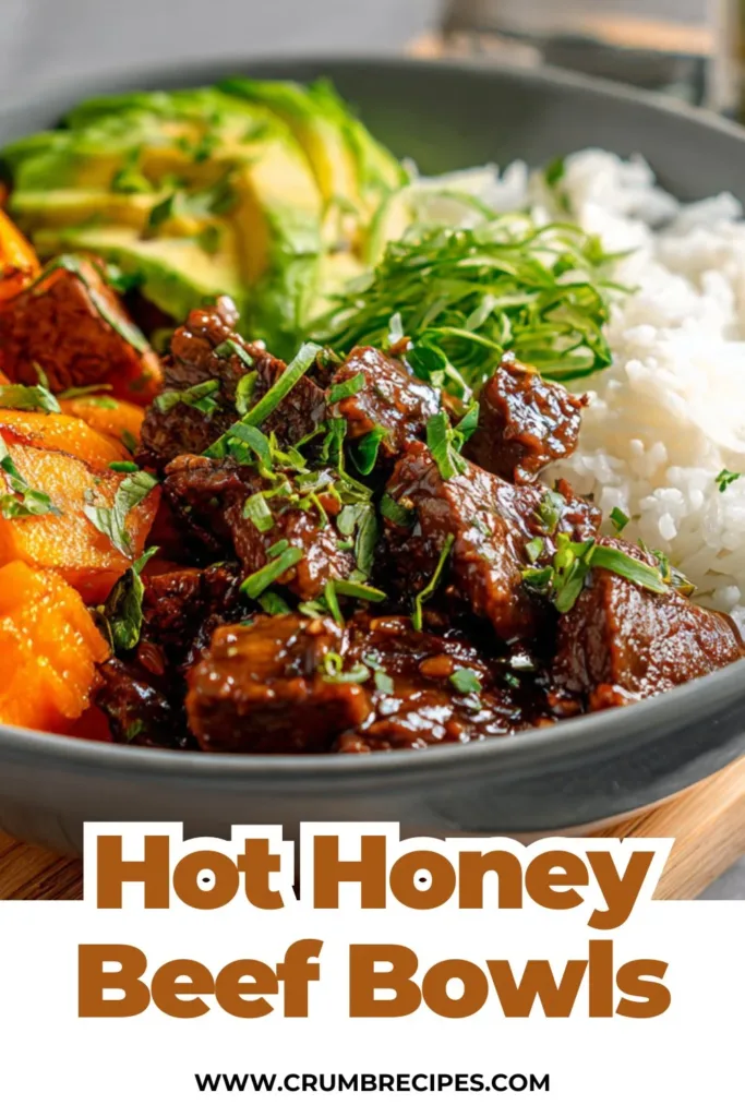 Hot Honey Beef Bowls topped with fresh vegetables and drizzled with spicy honey sauce