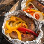 Campfire Italian sausage served with sautéed peppers and onions