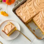 Delicious caramel buttermilk sheet cake served on a rustic wooden table