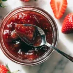Homemade easy strawberry rhubarb jam in a glass jar