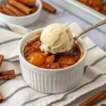Delicious saucy gooey pumpkin mug cake served in a mug